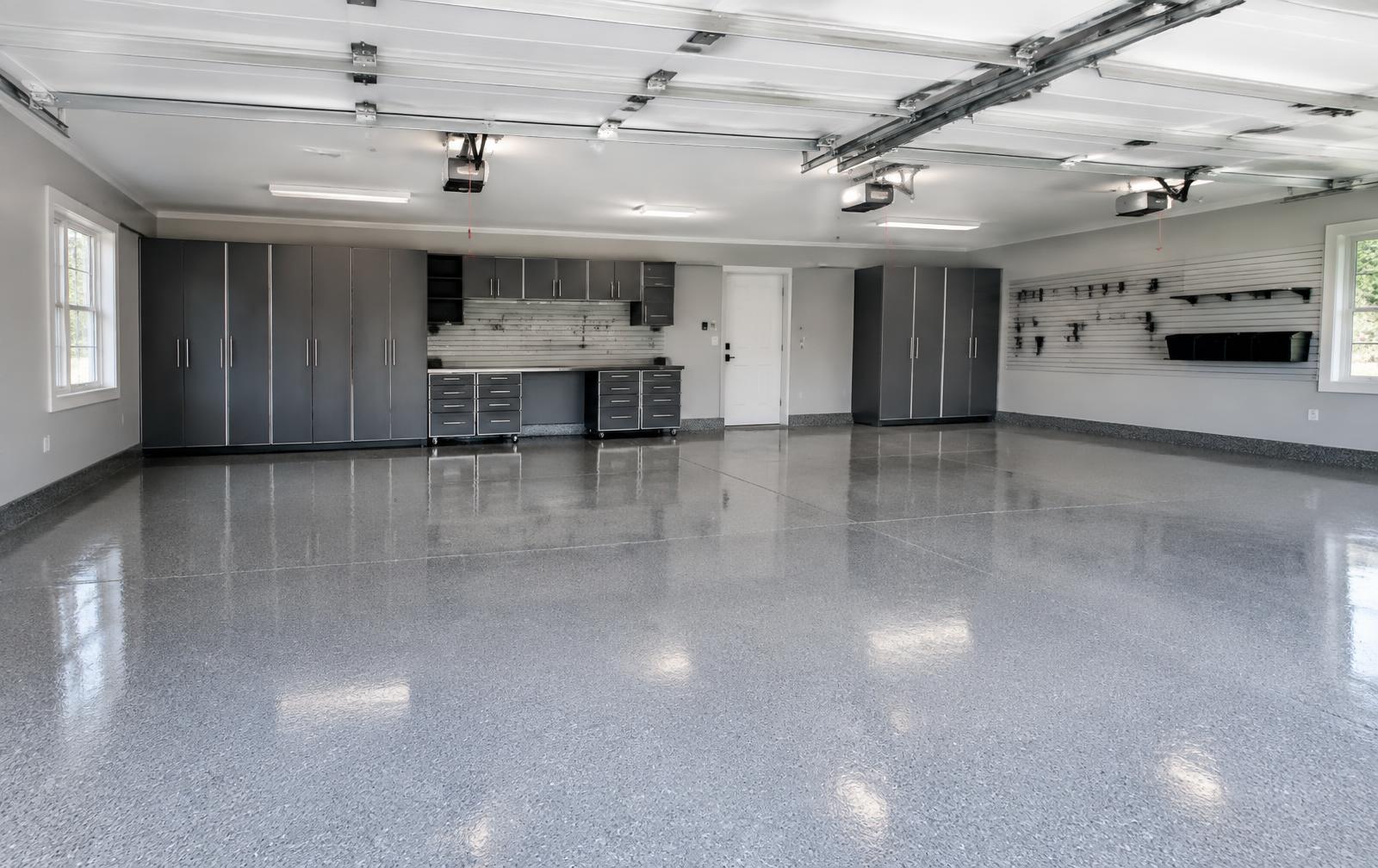 Spacious 3-car garage with coated floor